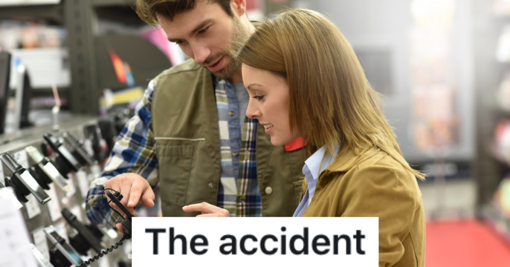 man and woman looking at a phone